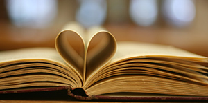 Book pages folded to form a heart